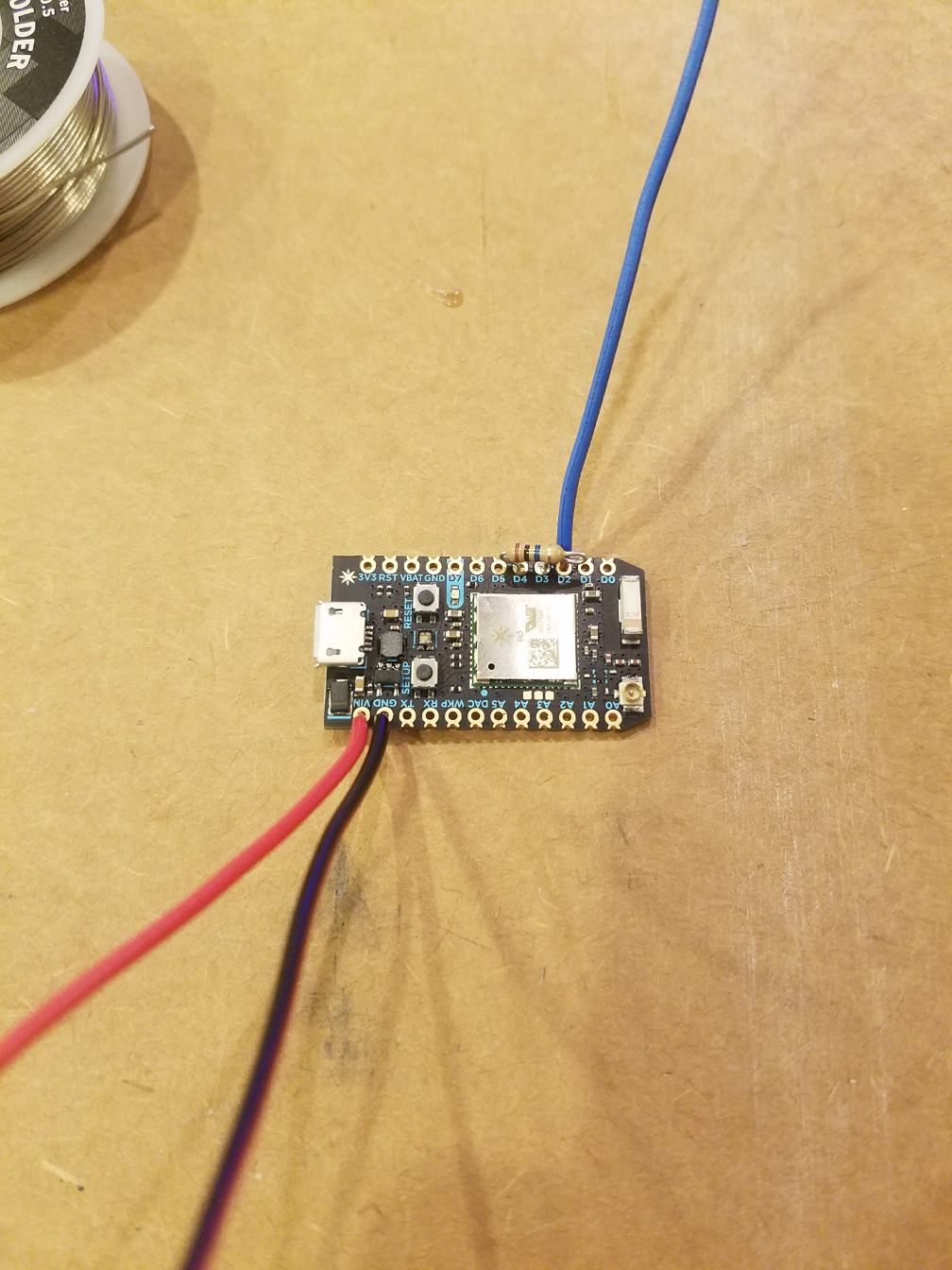 Photon with components soldered on